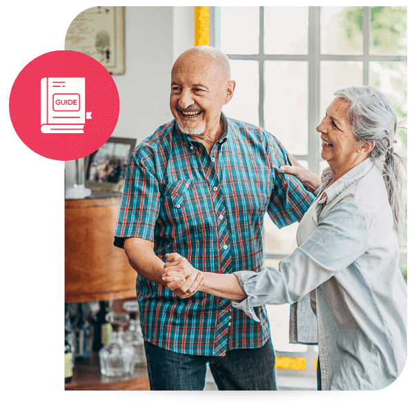 older couple holding hands smiling